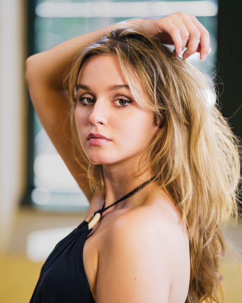 Portrait of a Blonde Woman Over a Blurry Background